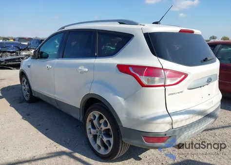 2015 Ford Escape Titanium z USA, uszkodzony, nr VIN 1FMCU0J95FUB14099